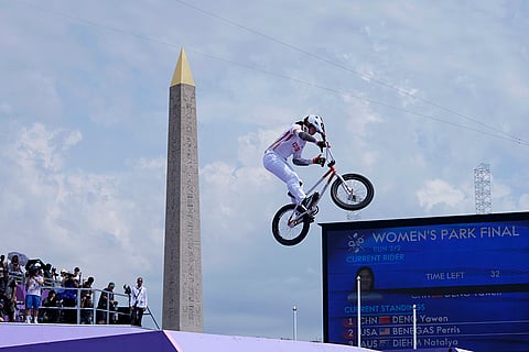 Deng Yawen performs a trick during BMX freestyle women's park final